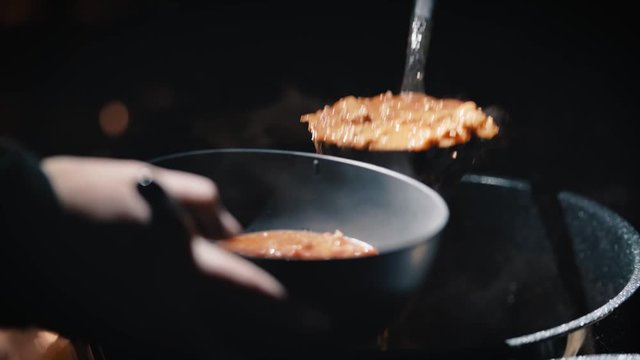 Chili served hot and steamy to camper for dinner