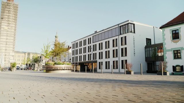 Pfaffenhofen an der Ilm town square on bright sunny morning, Bavaria, Germany, forward pan