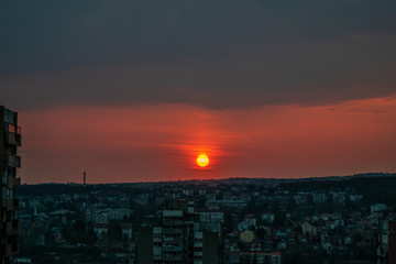 Beautiful sunset over Belgrade's neighborhood. Sunset over city buildings