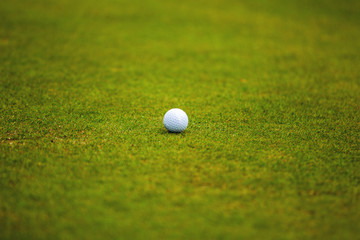 Player a during a golf game during a hit