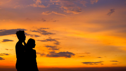 Fototapeta premium Silhouette of couples during sunset