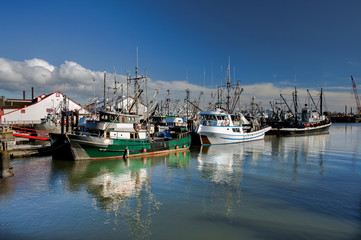 Fishing Boats in Marina and a cloudy sky. This marina is located in the Stevestone area of Richmond. The fishing village formed in this place was the first settlement on the territory of  Richmond 