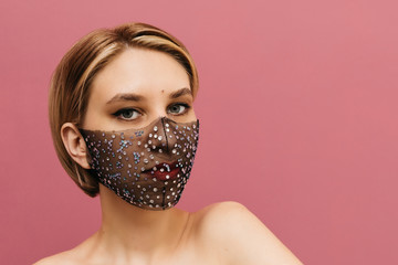 Girl in a fashionable medical mask