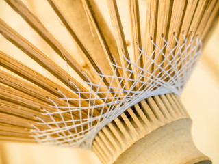 macro of bamboo umbrella with cotton weaving