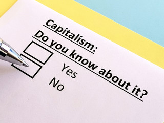 One person is answering quetion about capitalism.