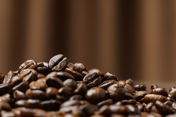 Roasted Coffee Beans texture on .Curtain background, macro.