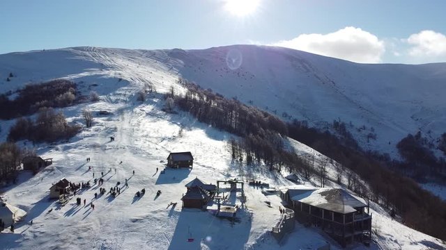 Aerial Shot | Gemba Mountains Ukraine | Ski & Snowboarding mountain in Ukraine | Snow & Winter Time in Ukraine Village of Gemba | Top of the Mountain | Sea of Clouds in Mountains.