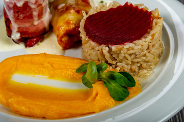 lunch with meat roll with vegetables and sauces and beets