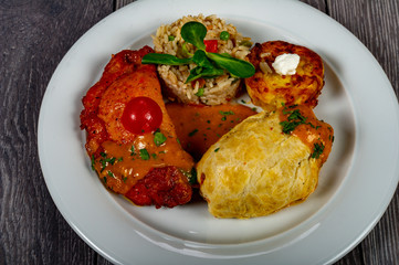 menu with meat, potatoes, vegetables and rice