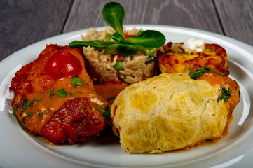 menu with meat, potatoes, vegetables and rice