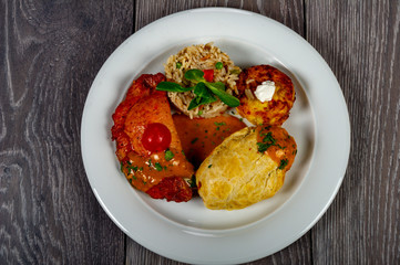 menu with meat, potatoes, vegetables and rice
