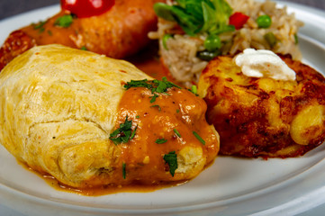 menu with meat, potatoes, vegetables and rice