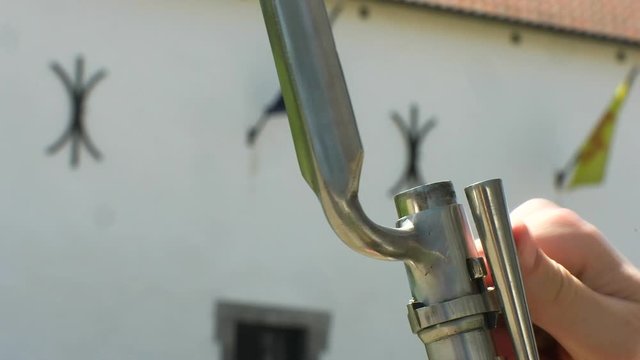 Preparing and charging a musket. Gun, rifle. Close.