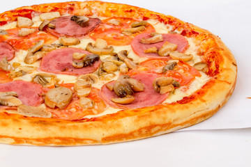 Pizza with sausage, tomatoes and mushrooms on a white background