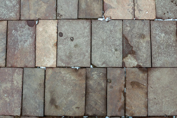 Mountain reddish stones laid out like a wall