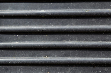 Black colored grille truck in zoom.