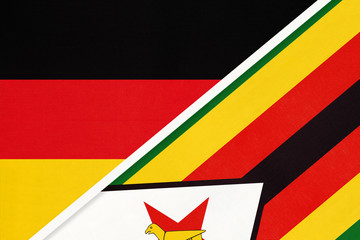 Germany vs Zimbabwe, symbol of two national flags. Relationship between European and African countries.