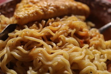 delicious fried noodles on a plate.
