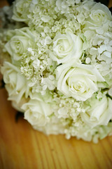 Flower bouquet on wooden table 