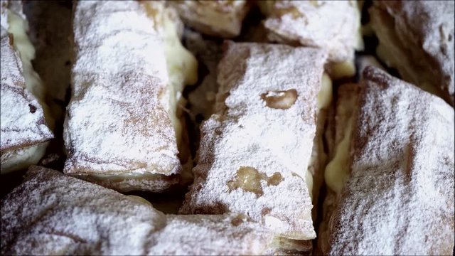 Fresh and hot pastry pies with sugar powder.