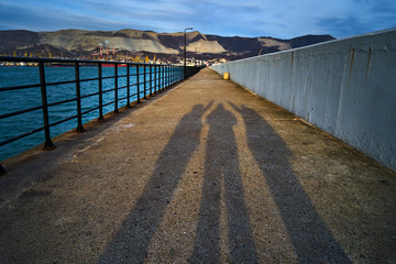 Concrete pier enclosing a seaport.