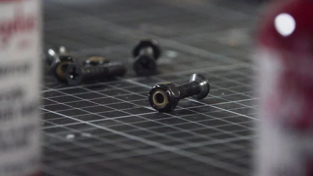 Falling Nut and bolt bouncing in Slow Motion 120fps Close Up