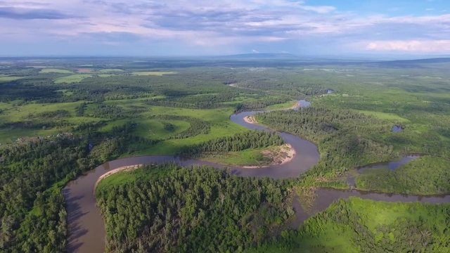 Aerial landscape with small winding Sim river in Russia, 4k