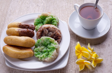 Bikang and Pukis Cake With a Cup of Tea