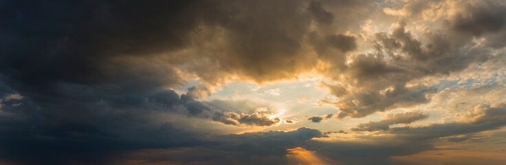 Naklejka na ściany i meble Spring Stormy Clouds on Sunset
