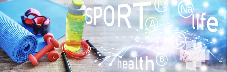 Sport and healthy lifestyle. Accessories for sports. Yoga mat dumbbell and jump rope. Sports background home exercises concept.