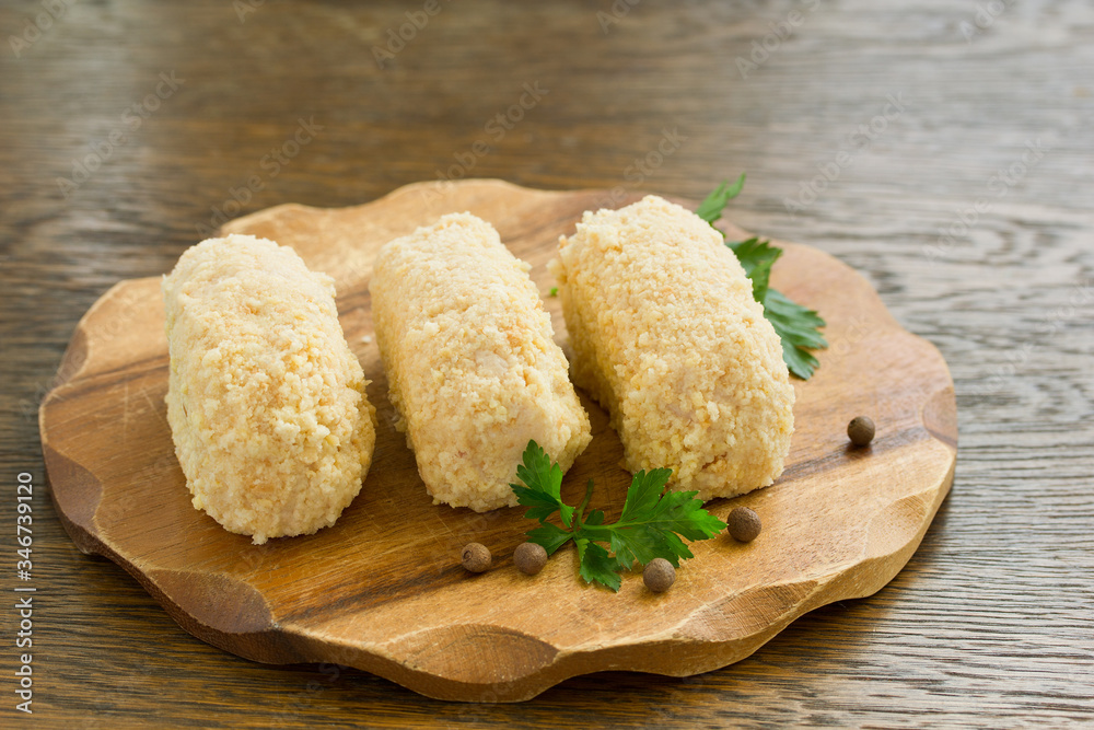 Wall mural chicken Kiev with a sprig of parsley. Ukrainian food.