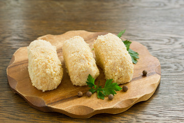 chicken Kiev with a sprig of parsley. Ukrainian food.