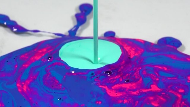blue acrylic paint splashing