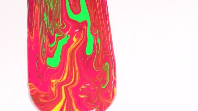 Abstract Pink, Yellow, Green Acrylic Paint pouring down White Background Extreme Close Up Slow Motion 120fps