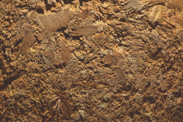Close up macro photo of a wooden briquettes. Wood material in briquette for a fire or a fireplace. Fuel for a stove, closeup.