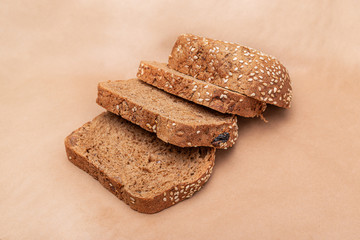 Sliced ​​bread on an old paper background. Slices of bread. Side view