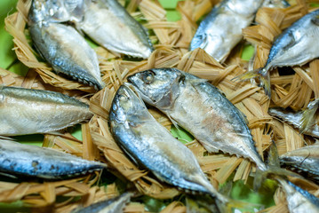 Mackerel in a wooden basket In the bazaar shops