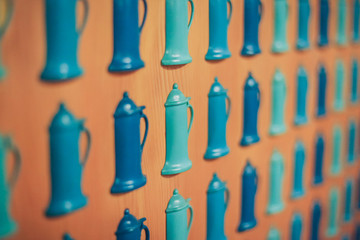 Beveled silhouettes of beer mugs on a wooden board. Good concept for a beer drinking background.