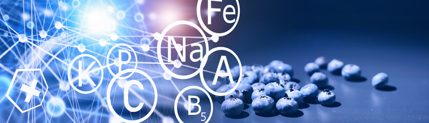 Fototapeta premium Water drops on ripe sweet blueberry. Fresh blueberries background with copy space for your text. Vegan and vegetarian concept. Macro texture of blueberry berries.
