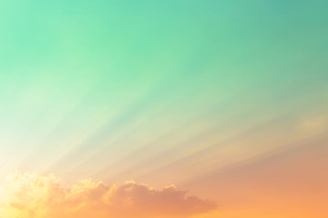 bright sunset with orange light in bright green sky