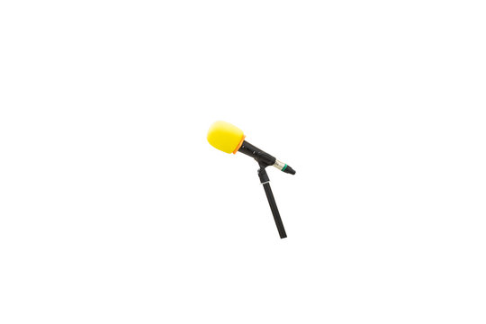 Dynamic microphones for singing vocals are covered with a yellow shockproof device around the head. An isolated image with white background.