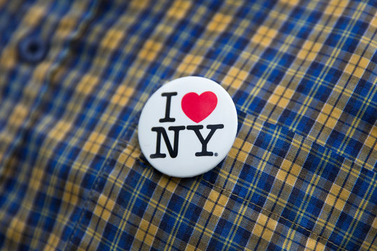 I love NY logo on a badge. This logo basis of an advertising campaign used since 1977 to promote tourism in the state of New York.