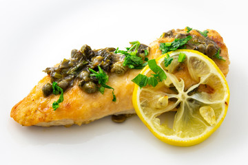 Chicken piccata with sauce, lemon and capers