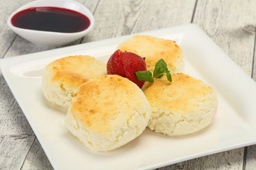 Curd pancakes with jam and stravberry