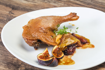 Roasted. duck. leg with plum and apple