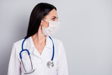 Close-up profile side view portrait of her she nice attractive confident girl head therapist clinic owner consultant practitioner isolated over grey pastel color background