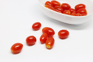 Close up group of cherry tomatoes on white background