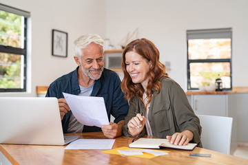 Couple working on laptop