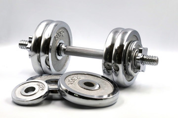 dumbbell weights on white background