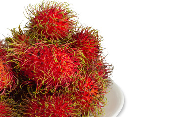 Rambutan is a fruit with red hair and a sweet taste